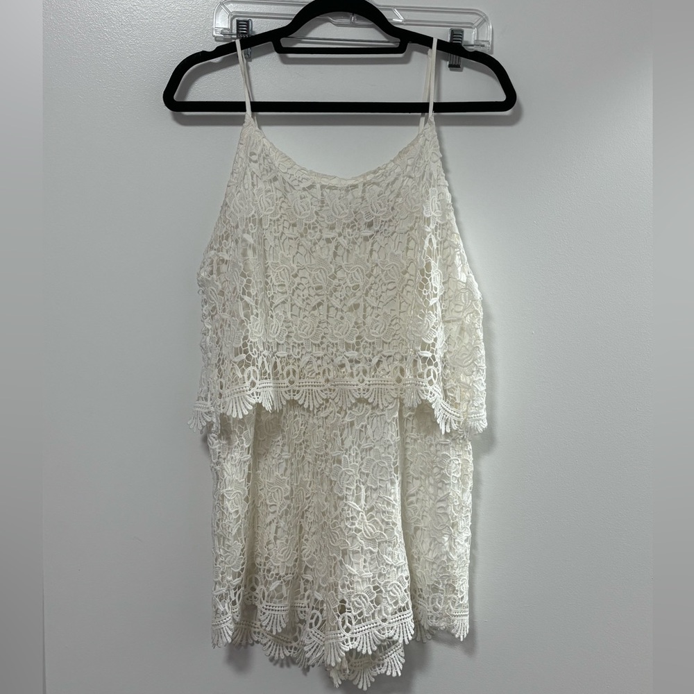 White lace romper, button detail on back size medium
